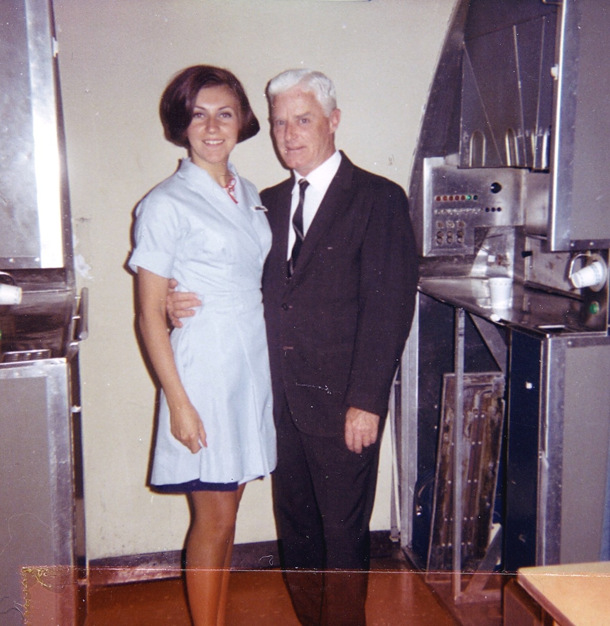 1968 April, Maureen van Leeuwen poses with John Kelly, Senior Instructor, Dining Services