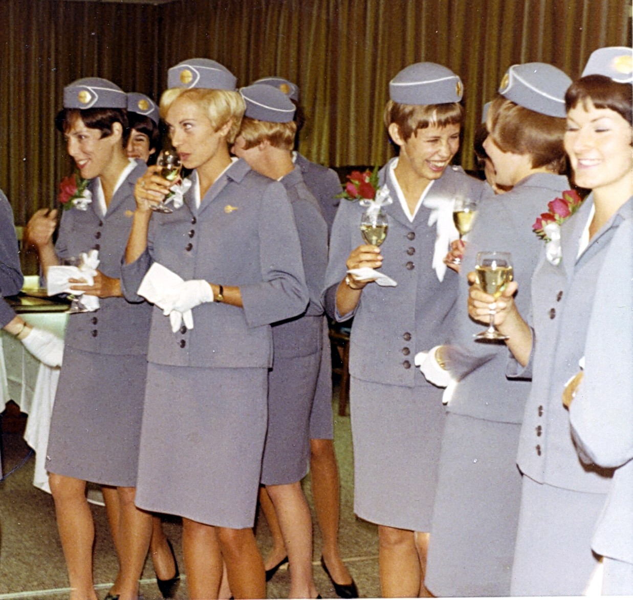 1968 May Flight Service Class 13 enjoy a Graduation toast at the Flight Service Academy in Miami, Florida.  The Graduation toast was the only time Pan Am flight attendants were allowed to drink alcohol in uniform.