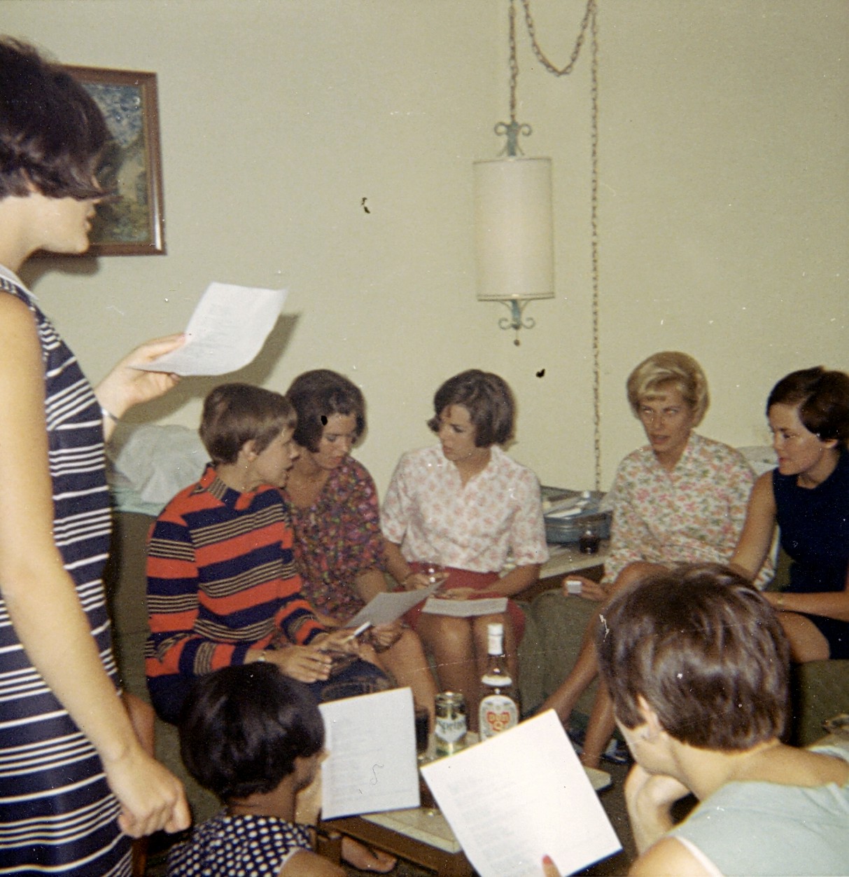 1968 April, Susan Darlington leading the class in a  practice of our graduation song sung to the tune of  Hey Look Me Over, Lend Me an Ear.